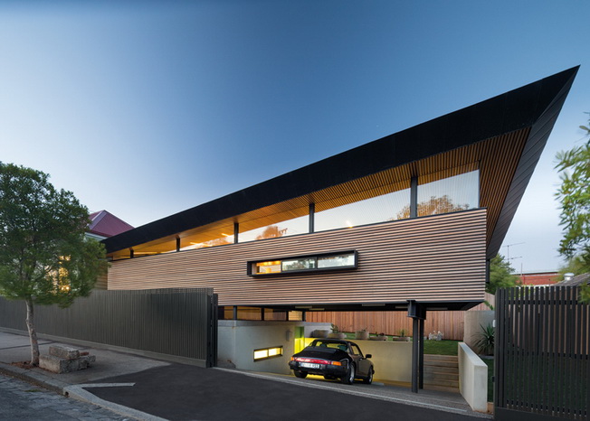 Wymagający, nowoczesny design dla przedłużenia dwupoziomowego domu w Australii